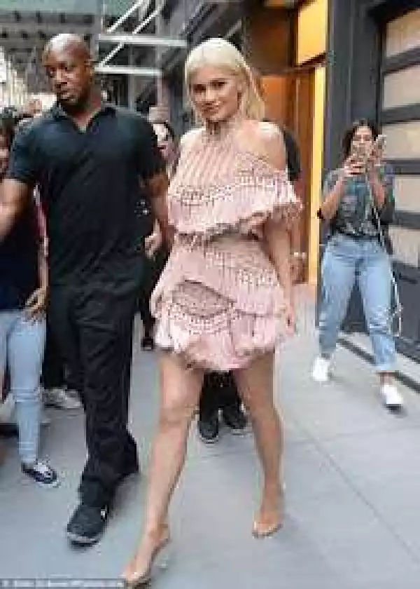 Kylie Jenner dazzles at Harper